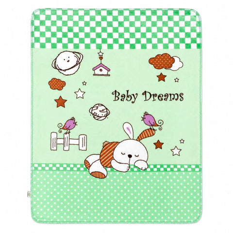A baby blanket or pouch featuring a light green background with cartoon illustrations of a sleeping bunny, stars, clouds, and the text 'Baby Dreams'. The top and bottom borders have green and white checkered and polka-dot patterns.