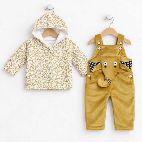 A baby clothing set displayed on wooden hangers against a white background, featuring a cream hooded jacket with mustard yellow abstract patterns and mustard yellow corduroy overalls with a playful elephant face patch and black-and-white polka dot ear accents.