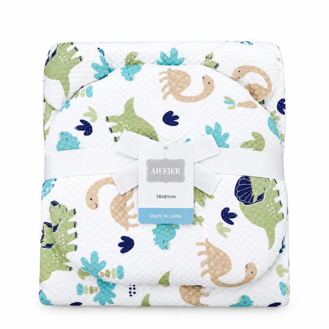 A folded baby blanket with a white background and a colorful dinosaur print, featuring a white ribbon and a paper tag that reads 'AIEFIER'.