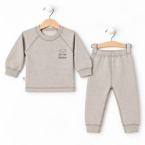 A baby two-piece clothing set featuring a heather light gray long-sleeve top and matching jogger pants, displayed on wooden hangers against a white background.
