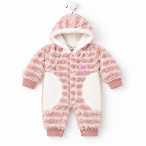 A baby's pink fuzzy hooded one-piece romper with white faux-fur panels on the legs and hood lining, shown hanging against a white background.