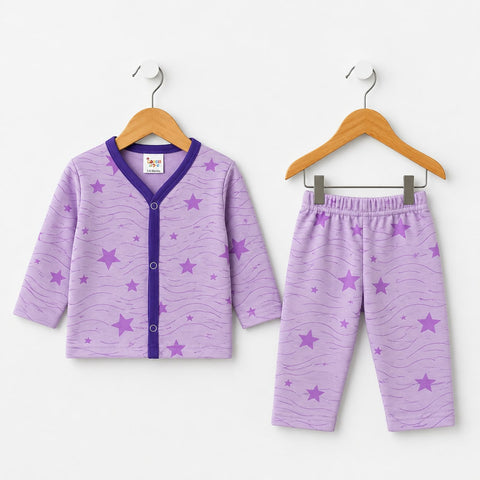 A two-piece baby pajama set in light purple, featuring a long-sleeve cardigan with a purple V-neck and star pattern, and matching star-printed pants, displayed on wooden hangers against a white background.