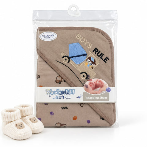 Wonderchild by Lisoft 'Boys Rule' baby hooded towel set in clear packaging, featuring a beige towel with a blue car design and black text, shown alongside cream knit booties on a white background.
