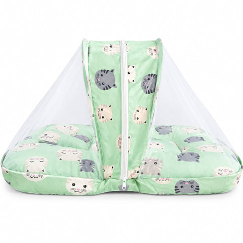 A baby bassinet with a mint green and white cat-patterned fabric base and a clear mesh mosquito net canopy, shown on a white background.