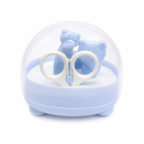 A light blue and white keepsake box with a clear dome lid, containing a pair of white-handled scissors and two small blue bear figurines, set against a plain white background.