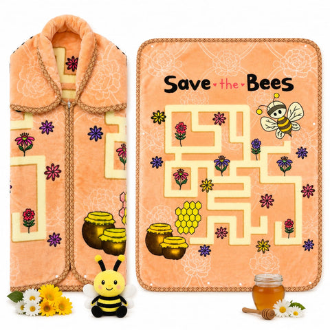 A fleece blanket shown in two views on a white background: a hooded robe-style view on the left and a flat maze view on the right with the text 'Save the Bees.' The blanket is peach/coral with cream maze paths, floral accents, honey pots, a bee illustration, and small flower props at the bottom.