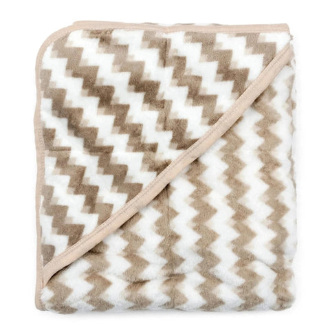 A folded plush throw blanket featuring a beige and white chevron pattern with a solid beige border and matching diagonal edge trim, shown against a plain white background.