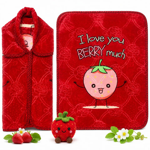 A red plush blanket set featuring a folded view on the left and a flat view on the right with the text 'I love you BERRY much' and a cute cartoon strawberry. A small plush strawberry toy and decorative fresh strawberries and flowers are placed in front on a white background.