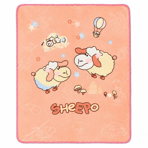 A square peach-colored blanket featuring a cute cartoon sheep design, a hot air balloon, stars, and the word 'SHEEPSO' printed at the bottom, finished with a pink stitched border.