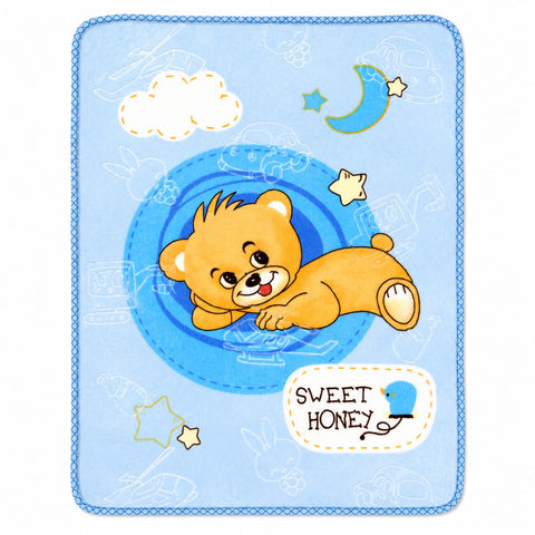 A square baby blanket with a light blue background and a stitched border, featuring a cartoon teddy bear in a space capsule with stars, clouds, and the text 'SWEET HONEY'.