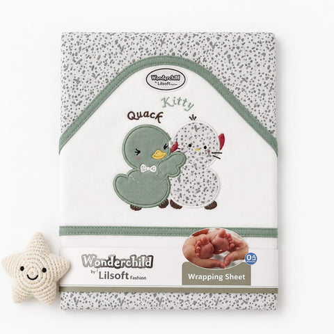 Wonderchild Lilsoft Fashion 'Quack Kitty' wrapping sheet, featuring a cute embroidered duck and snowman design on a white background with gray speckled borders. A small cream-colored crochet star toy is placed next to the sheet.