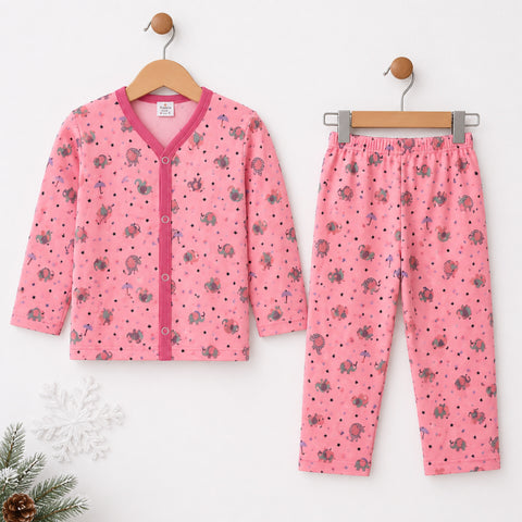 A children's two-piece pajama set hanging on wooden hangers against a white wall. The set includes a pink long-sleeve cardigan with a V-neck and button front, and matching pink pants with an elastic waistband.