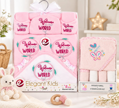 Baby gift set featuring pink hooded towels and blankets with 'Welcome World' and 'Pretty' embroidery, shown in retail packaging alongside a plush bunny toy and soft home decor props.
