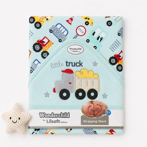Wonderchild by Lilsoft 'little truck' baby wrapping sheet in light blue with a colorful truck pattern and applique, shown with a small cream star toy on a white background.