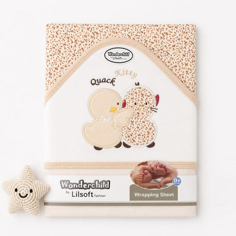 Wonderchild by Lilsoft kitten-themed wrapping sheet with a beige and brown spotted pattern, featuring embroidered cartoon kittens, on a white background with a small crochet star toy.