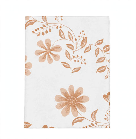 A rectangular white fabric item, likely a tea towel or napkin, featuring a dusty rose and terracotta floral pattern on a clean white background.