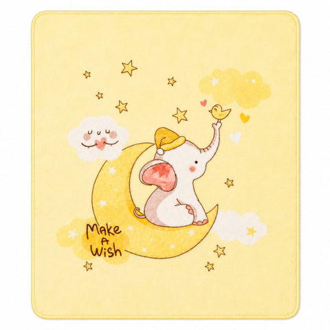 A square baby blanket with rounded corners, featuring a cute illustration of a white elephant wearing a yellow hat, sitting on a yellow crescent moon and reaching toward a small yellow bird. The background is a soft pastel yellow with scattered gold stars, white clouds, and the text 'Make a Wish'.