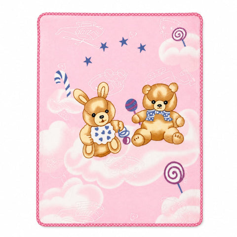 A square pink blanket or throw featuring a whimsical cartoon design of two teddy bears floating in clouds, holding lollipops, with blue stars and candy cane motifs on a light pink background.