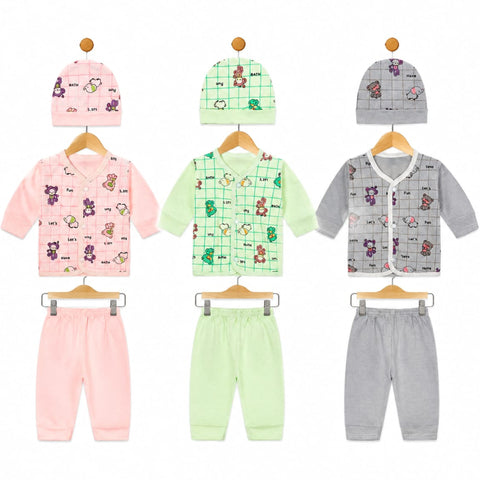 Three baby clothing sets displayed on wooden hangers against a white background, each including a long-sleeve top and pants in soft pastel colors with cartoon animal prints and grid patterns. The sets are pink, mint green, and light gray.