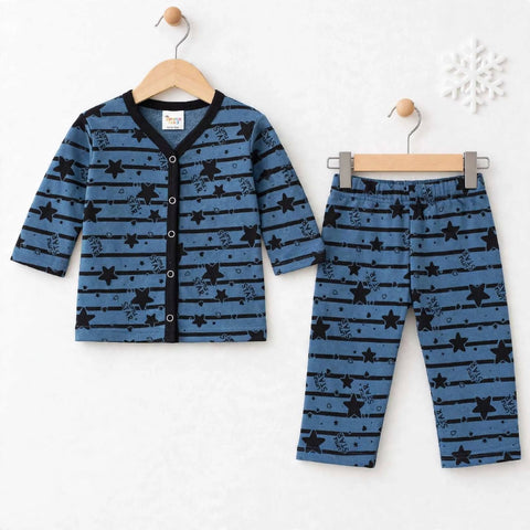 A two-piece baby clothing set consisting of a long-sleeve button-front cardigan and matching pants, both in a medium blue fabric with black horizontal stripes, stars, and small decorative motifs. The cardigan has a black trim and button placket.