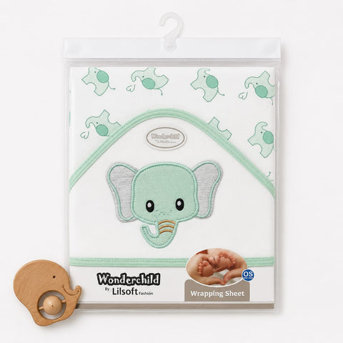 Wonderchild by Lilsoft baby wrapping sheet in a clear plastic bag with a hanger, featuring a mint green elephant applique on a white background. A small wooden elephant pacifier clip is placed in front on a clean white background.